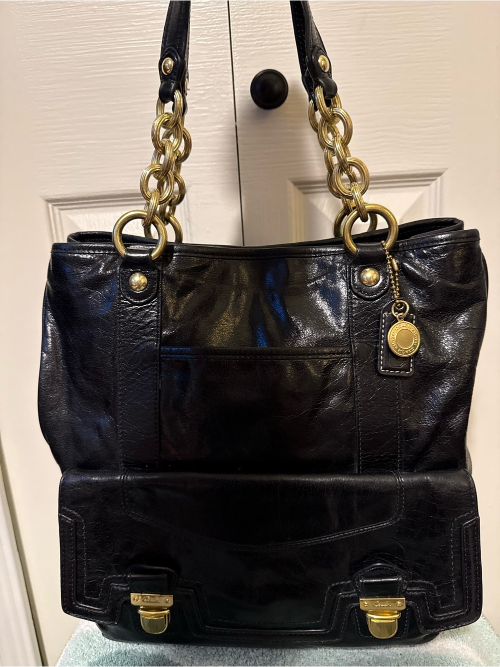 Coach Poppy Camelia Black Leather Shoulder Bag with Gold Chain Accents